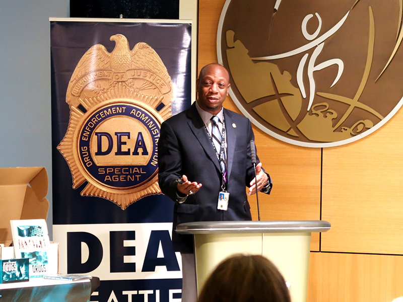 Marcus L. Picket, DEA Community Outreach Specialist briefed those attending on the extent and severity of the drug overdose epidemic in Seattle.